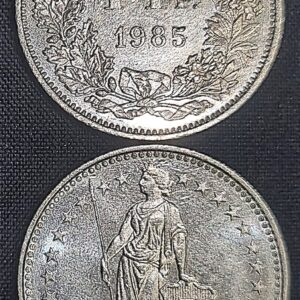 Moeda Suíça – Km024a.3 – 1 Franco – 1985 – Cuproniquel – 4,40 Gr – 23,20 mm – Excelente Peça