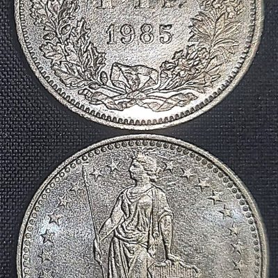 Moeda Suíça – Km024a.3 – 1 Franco – 1985 – Cuproniquel – 4,40 Gr – 23,20 mm – Excelente Peça