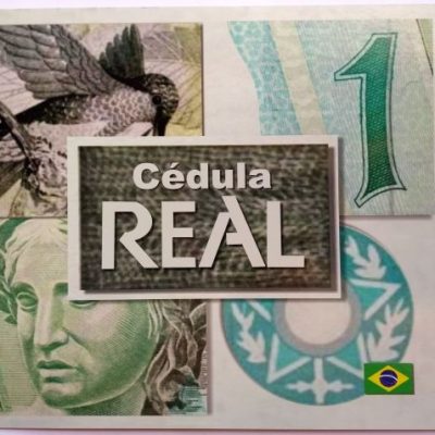 Folder com cédula de 1 Real - Primeira família